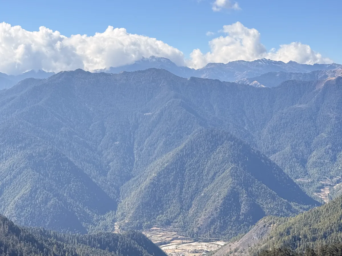 The valley opening out below the road