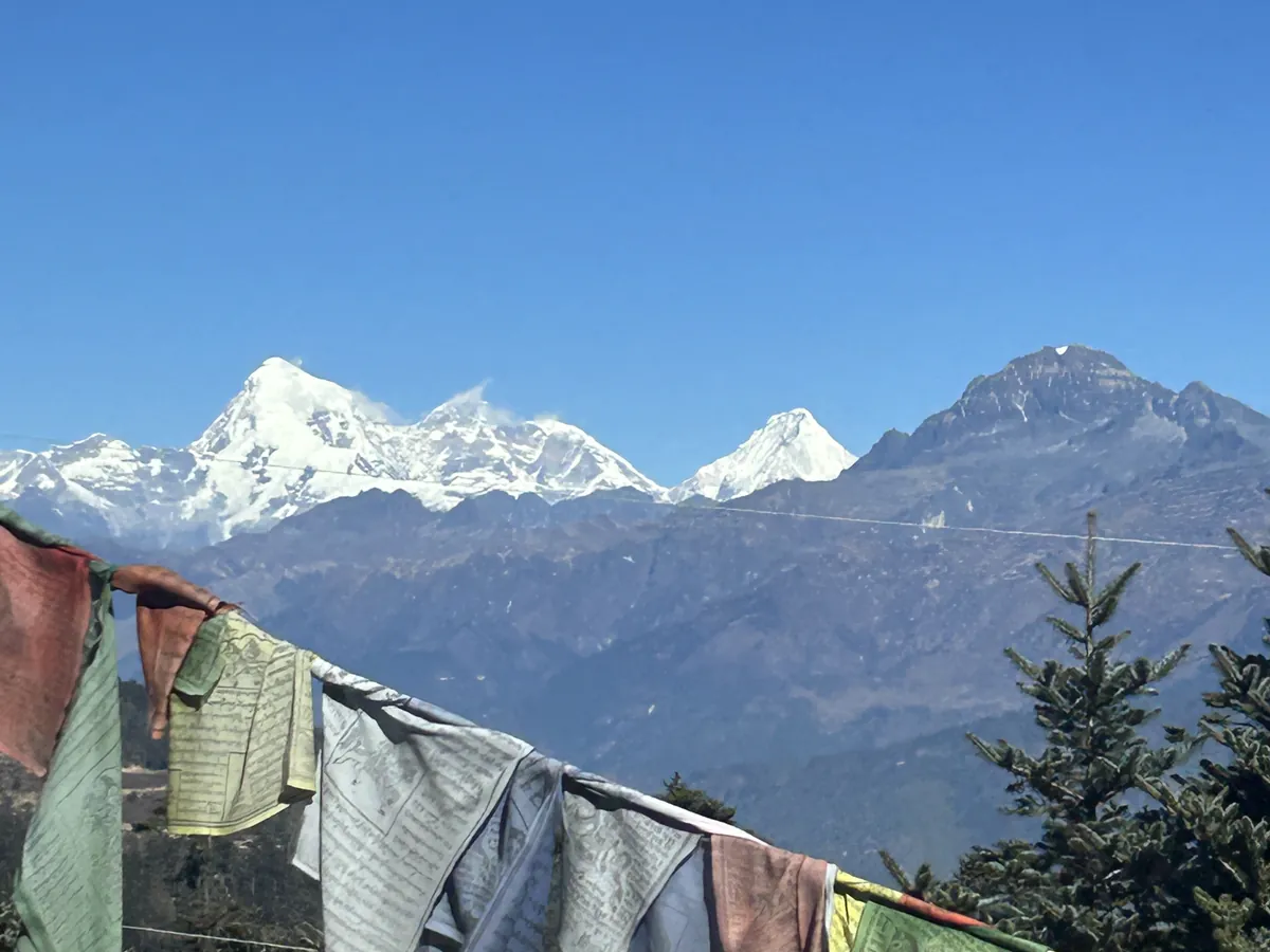 The eastern Himalaya from the pass, prayer flags in the foreground