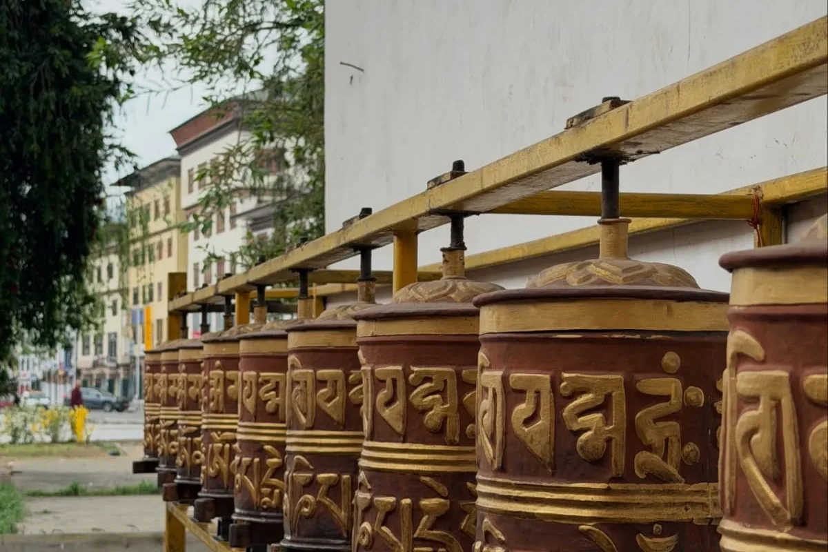Prayer wheels in a row on Bhutan Heritage Trail